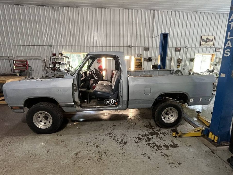 Before — a tired 1980s Dodge D150 as it arrived at the shop