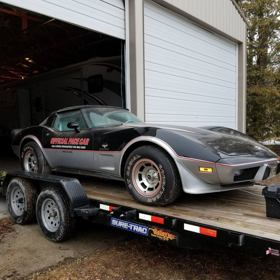 Stage 2 — loaded on the trailer and hauled to the shop