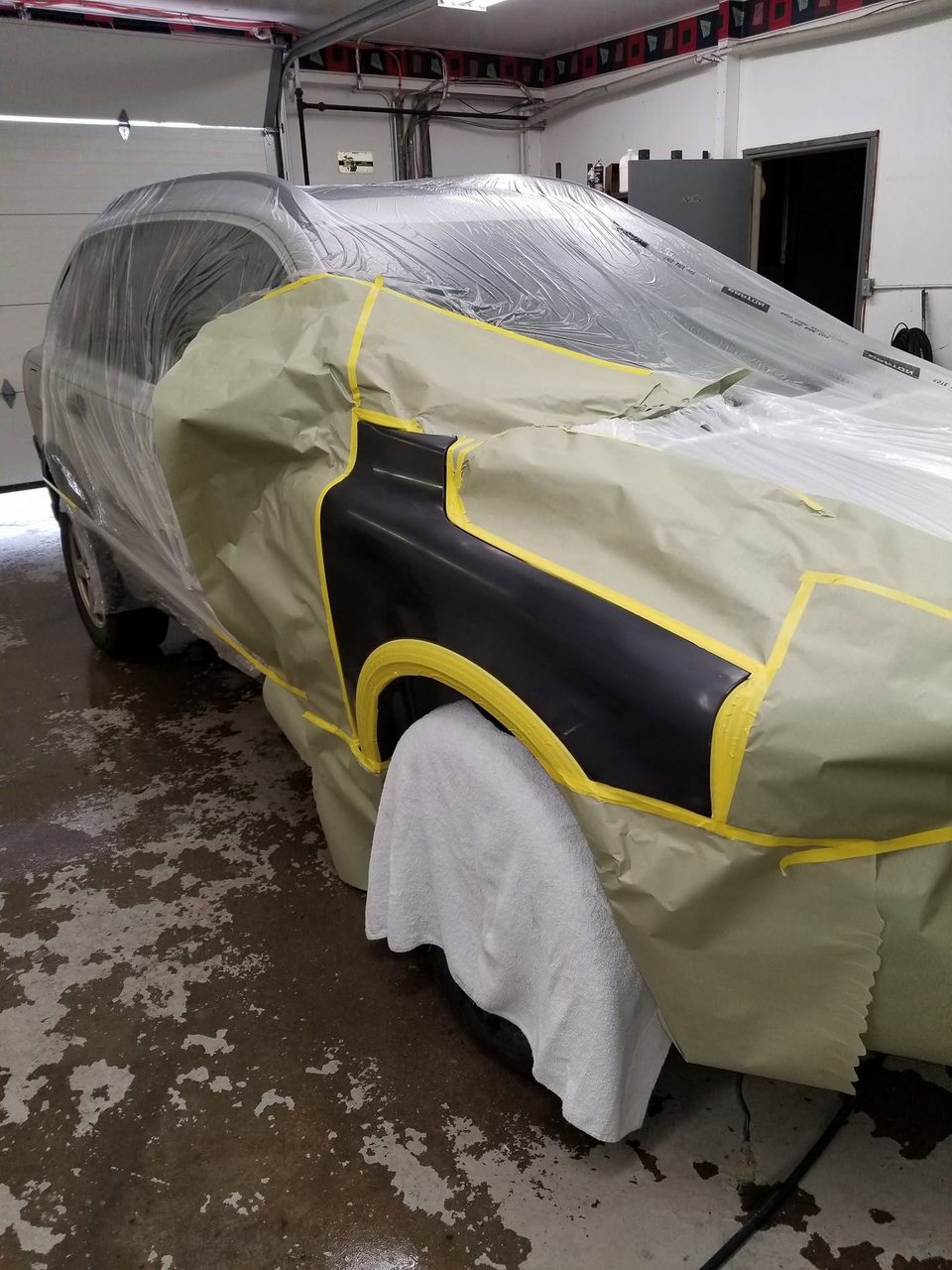 Stage 3 — masked up in the shop for refinishing
