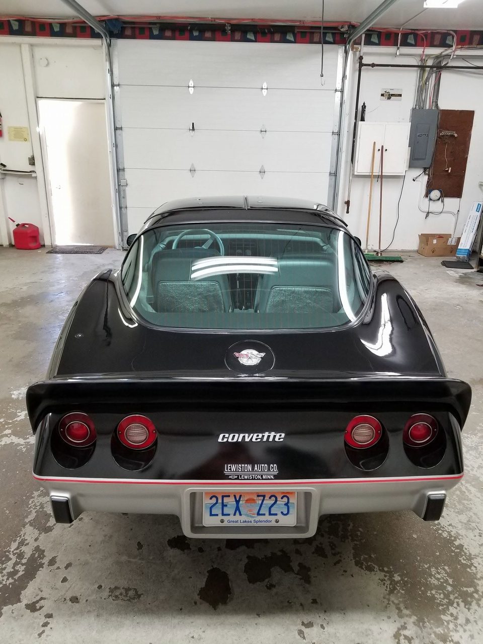 Stage 6 — finished, rear three-quarter in the bay